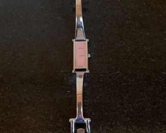 $150 Gucci ladies watch.  Pink face. 