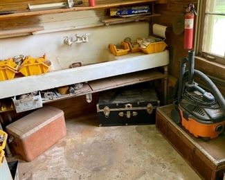 another view of the workshop; shop vac, trunks