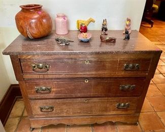 marble top oak dresser, gourd vase, naive pottery (look at the sad but sweet cat)