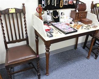 marble table with vintage to newer jewelry