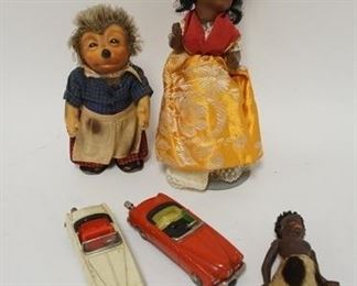 1011	LOT OF VINTAGE DOLLS AND SCHUCO TOY CARS
