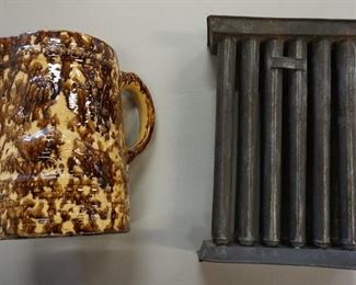 1035	2 PC PRIMITIVE LOT, BROWN SPATTER JUG AND 12 PART CANDLE MOLD
