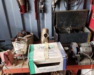 1001	

Metal Roll Cart with Vise, Bench Grinder, Black & Decker Valve Grinder, and More
Measures approximately 30" x 42" x 24"