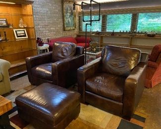 Pair of Thomasville leather club chairs with ottoman.