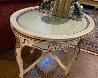 Painted antique table with framed glass top.