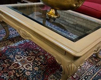 Beautiful neutral coffee table with glass insert.