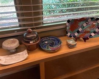 Many pottery pieces.
