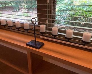Iron centerpiece with candles.