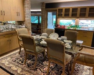 INCREDIBLE glass topped pedestal dining table! With 6 upholstered chairs.