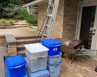 Totes, extension ladder and wheel barrow.