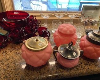 Pink satin biscuit jars.