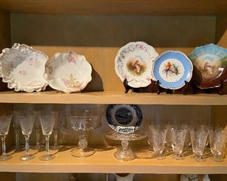 Painted china and etched crystal stemware.