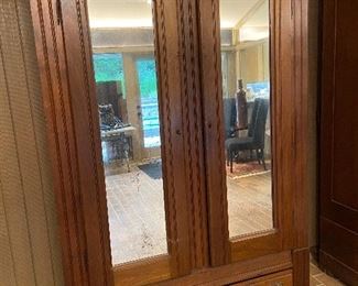 HUGE mirrored front armoire.
