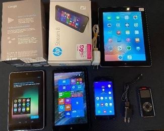 First generation IPad (32 gb), Samsung Galaxy cell phone, Nexus 7 Google tablet, Stream 8 HP PC tablet and an old school iPod.