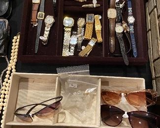 Sunglasses, men's and ladies' watches.