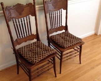 Carved cane seat chairs (2), sold separately from table  $150 / pair