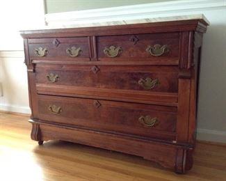 Antique Marble Top Chest, 4 drawers $250.  Burled walnut or mahogany.  31h 18d 42w.   Small light stain on marble top.  