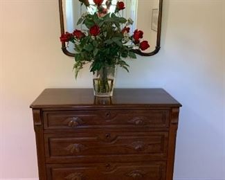 Victorian carved mirror and chest  $400 if purchased together, separately: 
Mirror $150,  31-1/2"w x 30"h,                                Victorian  Dresser with Hand Carved Pulls  $300     Note:  Faux Roses in resin $40, also available