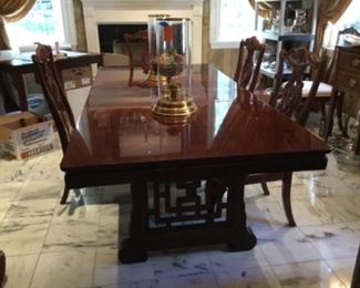 $895 Dining table Oriental style with two leaves & 6 chairs - 42"W x 29.5"T x 64"L without the leaves (88" with leaves)