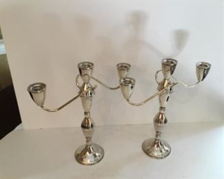 Pair of sterling weighted candlelabras