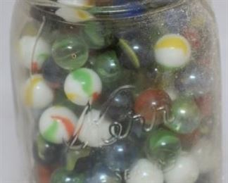 Lot# 58 - Glass jar of marbles