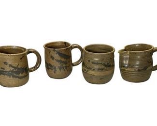 32. Jim Davis 4 Pottery Set
