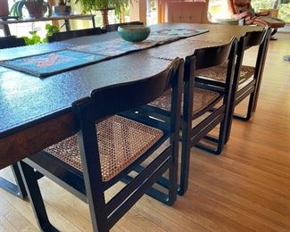 Beautiful modern dining room table with burled wood top