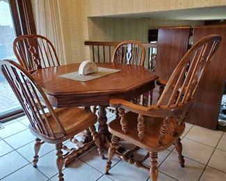 Ethan Allen Dining set. Two captains chairs and two side chairs, plus two 12" leaves. $250. Chairs to this set are still available through Ethan Allen.