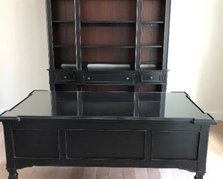Like new Stanley office furniture set. Beautiful black with wood backing on wall unit. Desk-32" deep x 62.5" wide x 31" high. Wall unit 67" wide x 89" high x 16" deep. $990