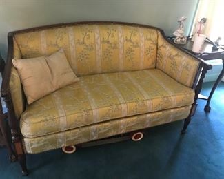 Lovely  settee with wood carving