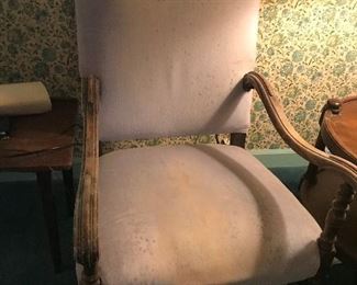 Vintage chair with carved arms and base