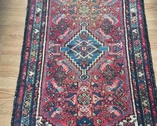 Rug Made in Iran, 29" x 52". 