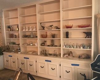 just some of this packed homes smalls -collection of bells - native american figurines , depression glass, brass items -pottery -mexican art -