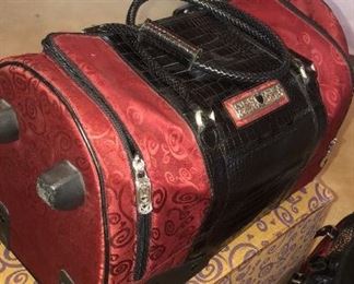 super nice brighton side wheeler duffle and matching cosmetic bag in ruby and black w/ original box