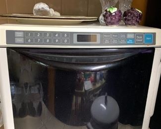 This is the weirdest microwave I've ever seen.  Mom spent 2 weeks thinking it was a bread maker and complaining that she had no where to heat up her coffee.  