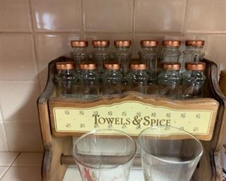 I don't know what genius decided to combine a spice rack with a paper towel holder but I salut you sir.  Or madam.  I'm not making any assumptions.  