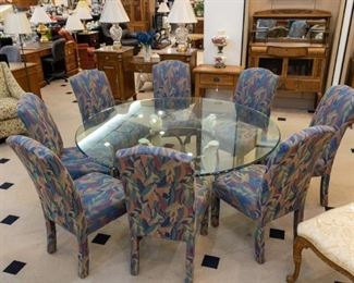 Very heavy round glass table with eight chairs!