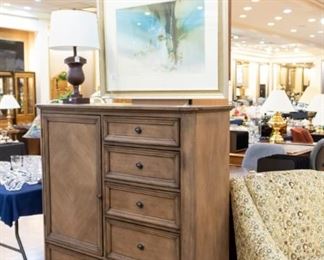 This piece was just purchased from Ross Furniture on 3-31-18 - with a retail price of $1,799 (receipt in top drawer).  Excellent condition and very nice!