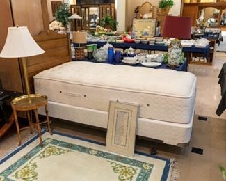 Antique twin bed and super nice mattress.
