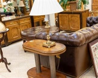 The tops of these end tables swivel out! Heavy and well made.