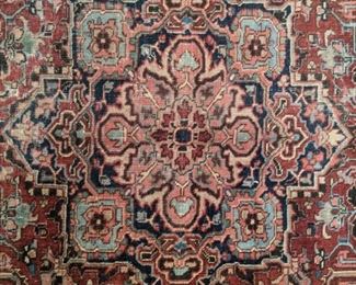 Close-up of the center medallion of the antique Persian Heriz rug. 
