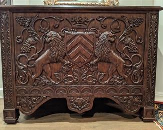 Wonderful Maitland-Smith hand-carved mahogany chest, with six hidden drawers, three on each side. Nicely carved and gilded wooden wall mirror; measures 44"W x 23"D x 31"T.