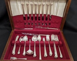 70-piece set Towle "Chippendale" sterling silver flatware in mahogany velvet-lined chest.                                                  No dancers were harmed or manhandled during photography.                                                                            Complete service for eight, plus serving pieces; “S” monogram.   The set weighs 5 lbs., 1 oz., or 2 kilos, 448 gm.