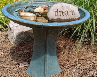 Glazed terra cotta water fountain.                                              At least the stone doesn't say Live, Laugh, Love...