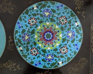 #1 of the three round panels of cloisonne on top of the Asian coffee table.