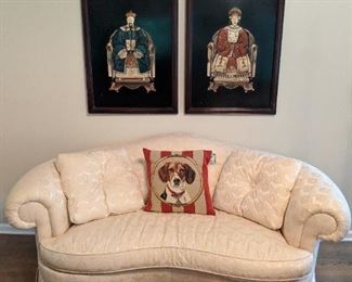 Pair of stone Chinese Ancestors on black lacquer plaques, Sovereign Collection down-filled sofa, by Hickory Chair and down-filled English needlepointed beagle pillow.