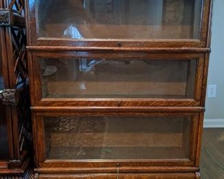 Antique three-stack Globe-Wernicke oak barrister bookcase.