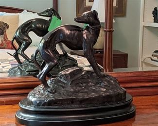 Mounted bronze greyhound statue. 