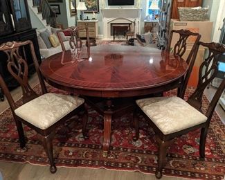 Just look at that sexy leg sticking out from under that Maitland-Smith dining table!                                                   Set/6 (4 shown here) Ethan Allen cherry wood side chairs, recovered in Scalamandré chinoiserie fabric. 