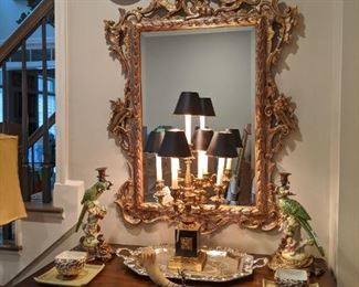 Vintage 5-light electrified candelabra, John Richard's mirror, pair of single candle porcelain parrot candleholders on bronze mounts.